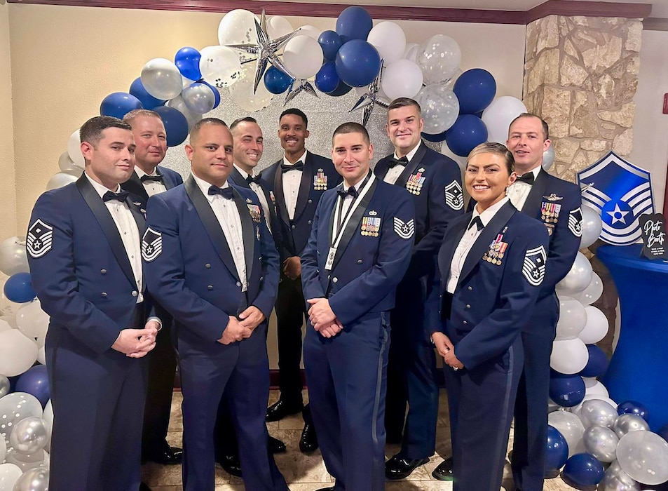 First Sergeants from the 97th Air Mobility Wing pose for a photo during a master sergeant release party at Altus Air Force Base, Oklahoma, Aug. 23, 2024. First sergeants advise commanders on the readiness, health, morale, welfare, and quality of life of Airmen and families. (courtesy photo)