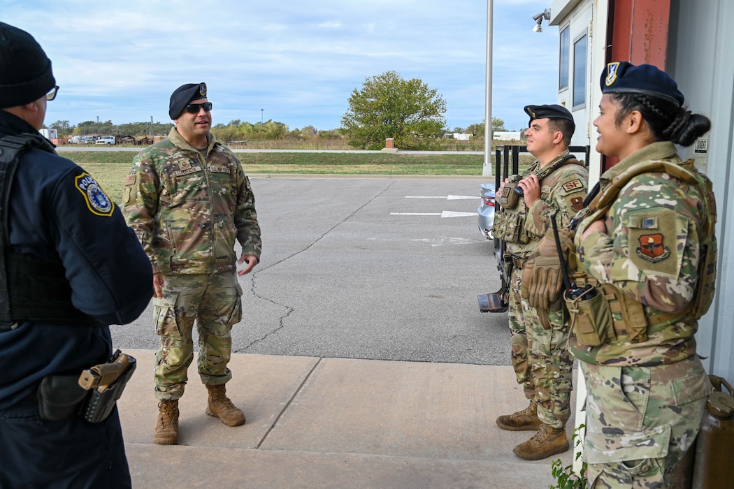 U.S. Air Force Master Sgt. Andres Posada, 97th Security Forces Squadron (SFS) acting first sergeant, interacts with Airmen from the 97 SFS at Altus Air Force Base, Oklahoma, Nov. 7, 2024. Posada took on his role after attending a First Sergeant Symposium in order to become an additional duty first sergeant. (U.S. Air Force photo by Senior Airman Miyah Gray)