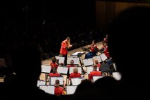U.S. Marine Corps 1st. Lt. Jose D. Toranzo, Assistant Director of "the President's Own" United States Marine Band conducts songs from their 2024 National Concert Tour on October 22, 2024, in Ogden, Utah. “The President’s Own” United States Marine Band’s mission is to perform music for the President of the United States and the Commandant of the Marine Corps. Founded in 1798 by an Act of Congress, the Marine Band is America’s oldest continuously active professional musical organization. (U.S. Marine Corps photo by Cpl. Luis A. Ponce Alavez Jr.)
