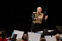U.S. Marine Corps Lt. Col. Ryan Nowlin, Director of "the President's Own" United States Marine Band and a Broadview Heights, Ohio native, conducts songs from their 2024 National Concert Tour. “The President’s Own” United States Marine Band’s mission is to perform music for the President of the United States and the Commandant of the Marine Corps. Founded in 1798 by an Act of Congress, the Marine Band is America’s oldest continuously active professional musical organization. (U.S. Marine Corps photo by Cpl. Luis A. Ponce Alavez Jr.)
