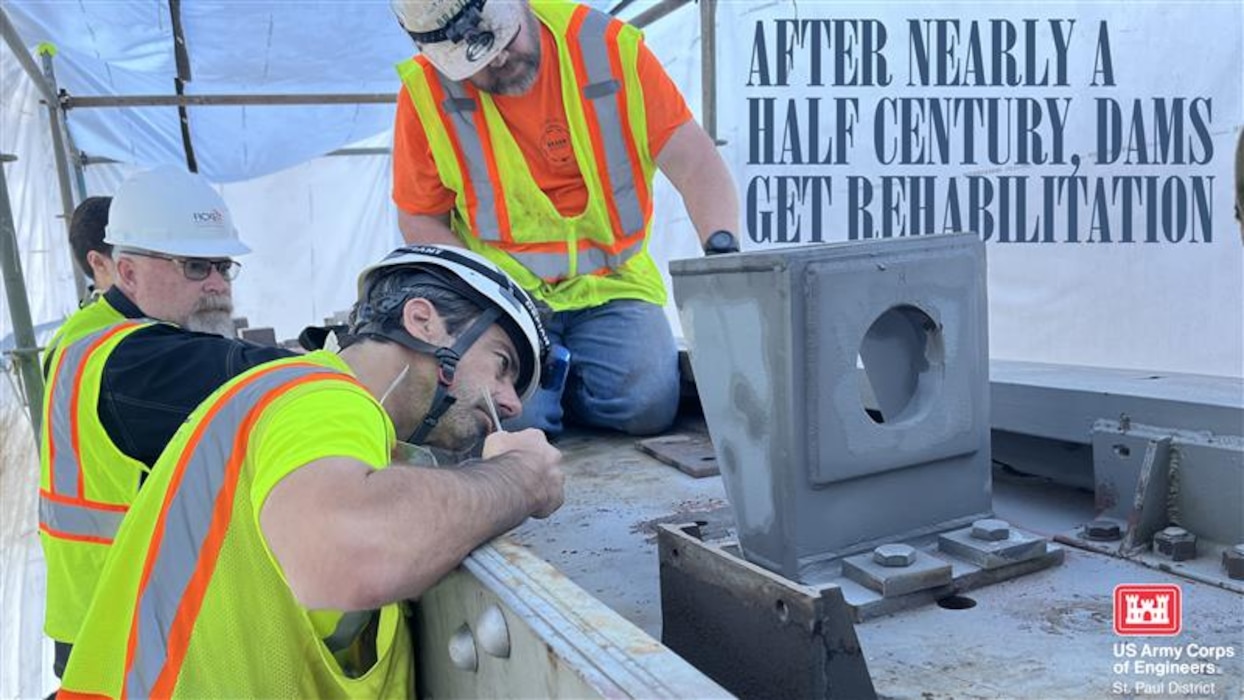 A photo of four men in safety gear working on a gate. The text says "After nearly a century, dam get rehabilitation."