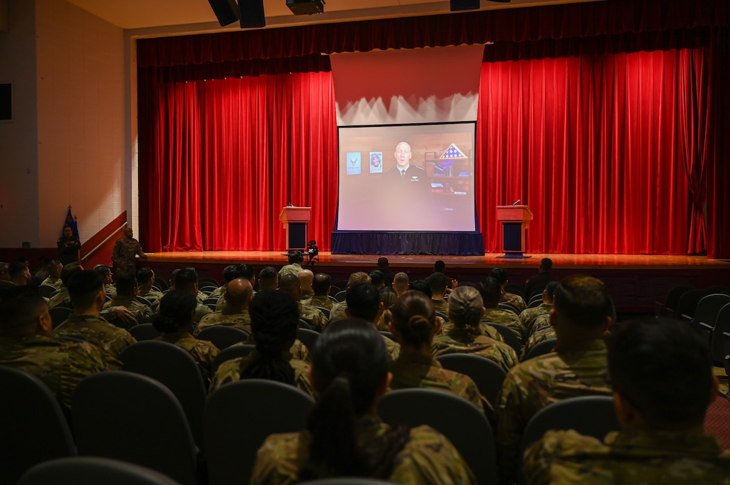 Hundreds of 433rd Airlift Wing Reserve Citizen Airmen watch a video presentation from Air Force Chief of Staff Gen. David W. Allvin during one of three wing stand-up sessions with a focus on risk management and operational discipline at the Bob Hope Theatre at Joint Base San Antonio-Lackland, Texas Nov. 2, 2024.