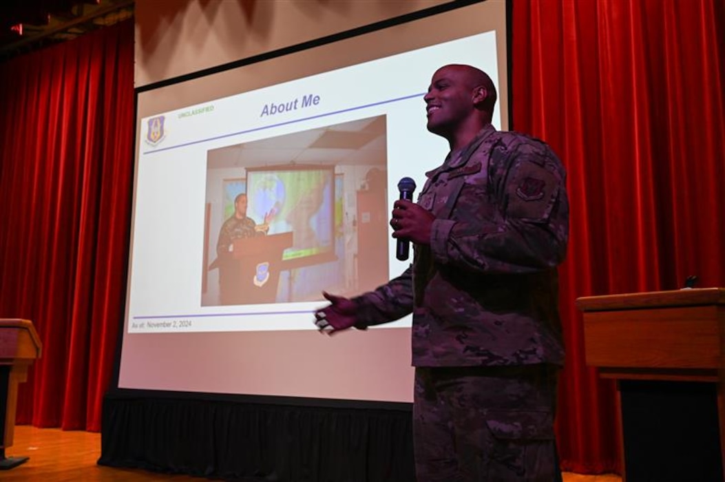 Chief Master Sgt. Jonathan J. Birk, 433rd AW command chief, addresses hundreds of Reserve Citizen Airmen at a wing stand-up session at the Bob Hope Theatre on at Joint Base San Antonio-Lackland, Texas Nov. 2, 2024.