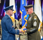 Air Force Gen. Steven Nordhaus, left, the 30th chief of the National Guard Bureau, hosts a change of responsibility ceremony for the senior enlisted advisor to the chief, NGB, Joint Base Myer Henderson Hall, Arlington, Virginia, Nov. 8, 2024. Incoming SEA John T. Raines, assumed the duties and responsibilities as the seventh senior enlisted advisor to the chief and the first Army leader to wear the distinctive rank insignia of the SEA.
