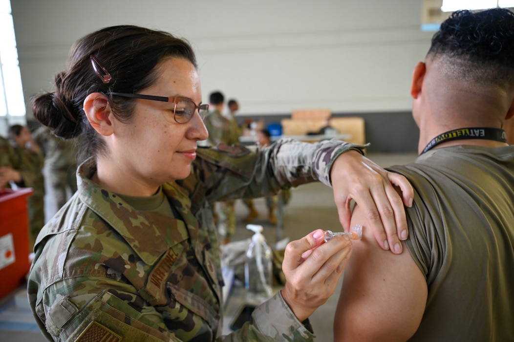 Tech. Sgt. Diana Martinez, a 433rd Medical Squadron medical technician, administers an annual flu vaccine to a 433rd Airlift Wing Reserve Citizen Airmen at a clinic on Joint Base San Antonio-Lackland, Texas, on Nov. 2, 2024.