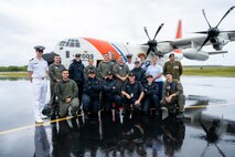 Members of an HC-130 Hercules airplane crew from Coast Guard Air Station Barbers Point and Coast Guard Fourteenth District staff pose for a photo with members of the Royal New Zealand Navy at Hanan Niue International Airport in Alofi, Niue, Oct. 19, 2024.