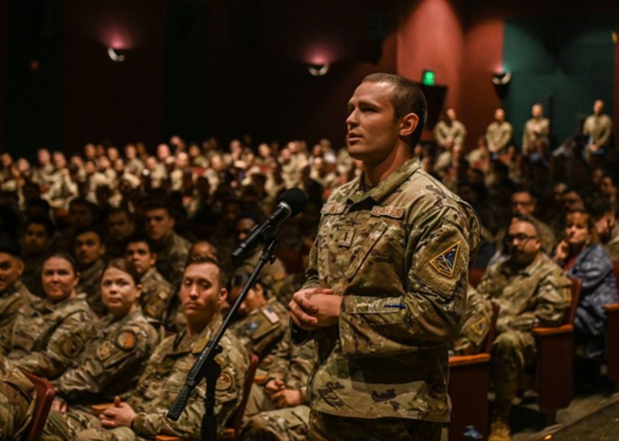 A 30th Contracting Squadron contract specialist, asks Chief Master Sergeant of the Air Force David Flosi a question during an all call at Vandenberg Space Force Base.