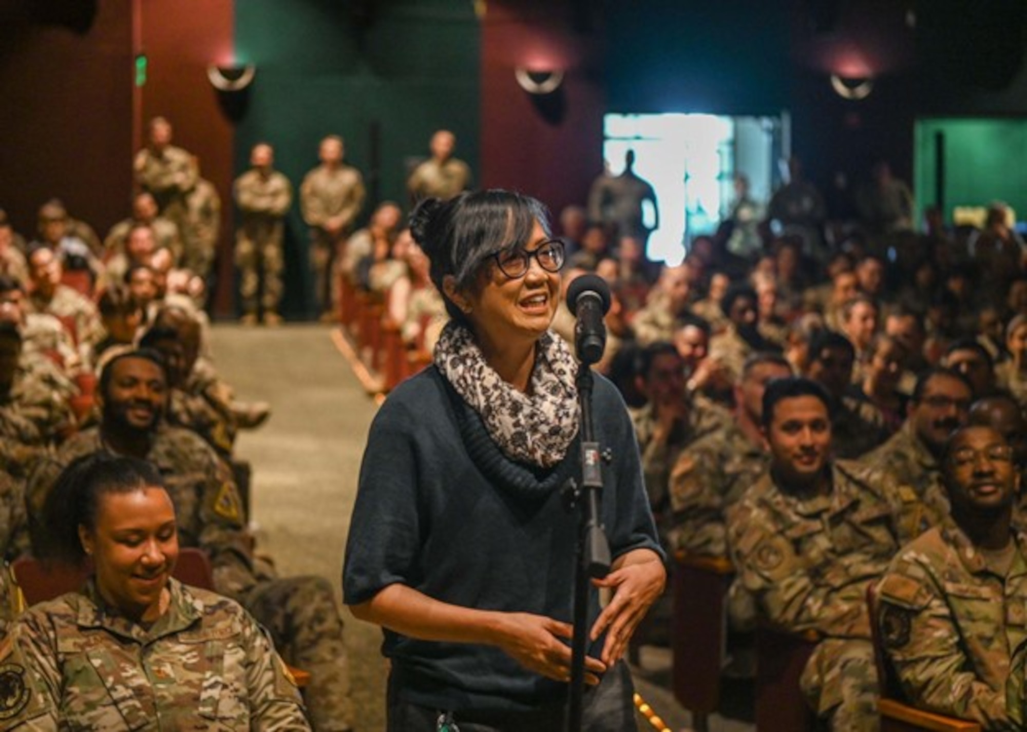 A Vandenberg Education Center education services specialist, asks Chief Master Sergeant of the Air Force David Flosi a question about tuition assistance during an all call at Vandenberg Space Force Base.
