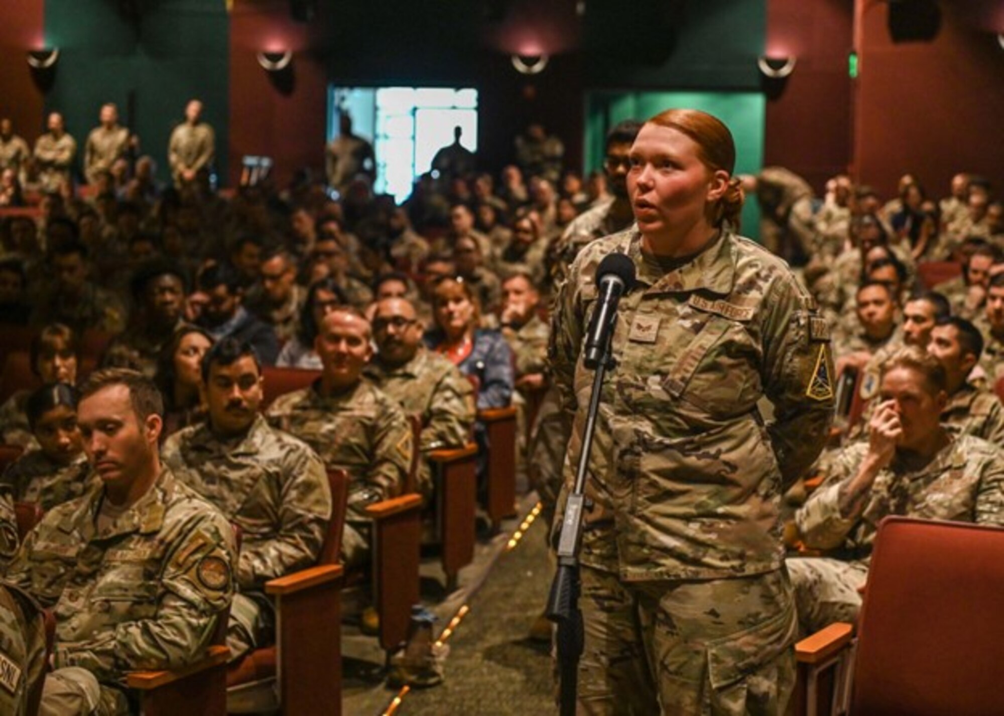 A 30th Civil Engineer Squadron emergency management journeyman, asks Chief Master Sergeant of the Air Force David Flosi a question about national security during an all call at Vandenberg Space Force Base.