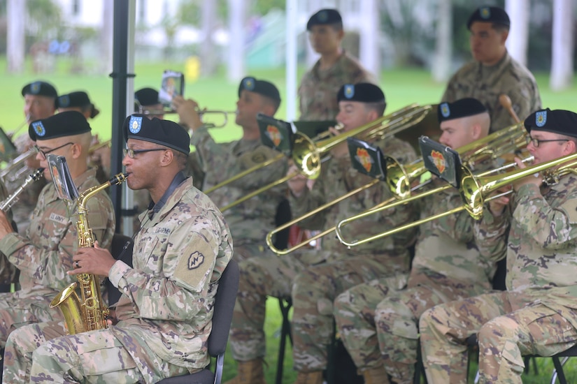 The 25th Infantry Division Band Soldiers play music during United States Army Pacific (USARPAC) change of command ceremony held at historic Palm Circle, Fort Shafter, Hawaii, Nov. 8, 2024.