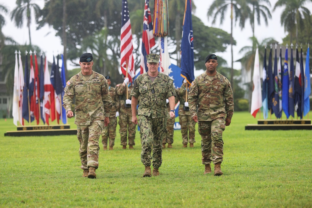 U.S. Army Gen. Charles A. Flynn, outgoing commanding general of U.S. Army Pacific, (left) Admiral Samuel Paparo, commander of U.S. Indo-Pacific Command,(middle) Gen. Ronald P. Clark, incoming U.S. Army Pacific commanding general (right) at the U.S. Army Pacific (USARPAC) change of command ceremony at Fort Shafter, Hawaii, Nov 8, 2024.