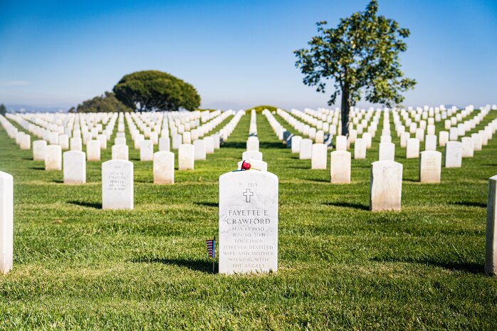 A rose lays upon the headstone of former Sergeant Major of the Marine Corps, Sgt. Maj. Leland D. Crawford, at Fort Rosecrans National Cemetery, San Diego, California, Nov. 10, 2024. The wreath laying ceremonies are a continuing part of the Marine Corps birthday tradition and honor the service to Corps and Country. (U.S. Marine Corps photo by Cpl. Francisco Angel)