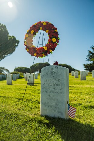 A rose lays upon the headstone of former Sergeant Major of the Marine Corps, Sgt. Maj. Leland D. Crawford, at Fort Rosecrans National Cemetery, San Diego, California, Nov. 10, 2024. The wreath laying ceremonies are a continuing part of the Marine Corps birthday tradition and honor the service to Corps and Country. (U.S. Marine Corps photo by Cpl. Francisco Angel)