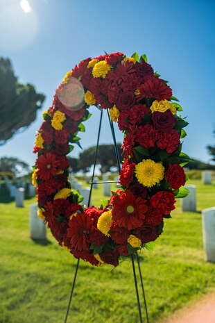 A wreath prepared for the headstone of former Sergeant Major of the Marine Corps, Sgt. Maj. Leland D. Crawford, at Fort Rosecrans National Cemetery, San Diego, California, Nov. 10, 2024. The wreath laying ceremonies are a continuing part of the Marine Corps birthday tradition and honor the service to Corps and Country. (U.S. Marine Corps photo by Cpl. Francisco Angel)