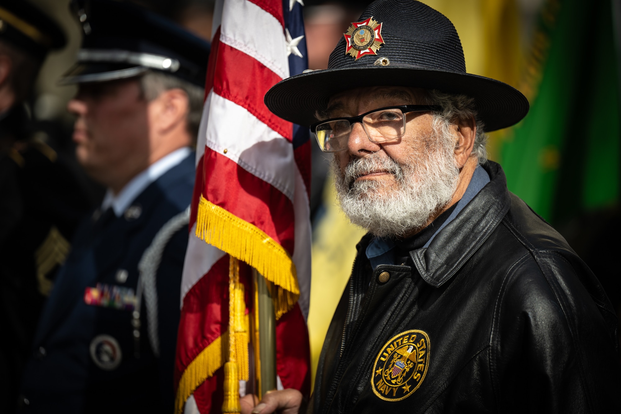 A U.S. Navy Veteran and member of the Veterans of Foreign Wars Post 1170 participates in the Massing of the Colors during the annual Veterans Day Parade in downtown Louisville, Ky., Nov. 9, 2024. The event, which drew thousands of spectators, featured appearances by more than 50 veterans groups, military units and civic organizations. (U.S. Air National Guard photo by Dale Greer)