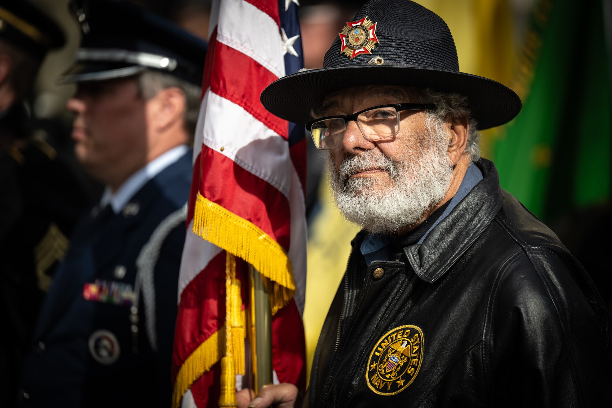 A U.S. Navy Veteran and member of the Veterans of Foreign Wars Post 1170 participates in the Massing of the Colors during the annual Veterans Day Parade in downtown Louisville, Ky., Nov. 9, 2024. The event, which drew thousands of spectators, featured appearances by more than 50 veterans groups, military units and civic organizations. (U.S. Air National Guard photo by Dale Greer)