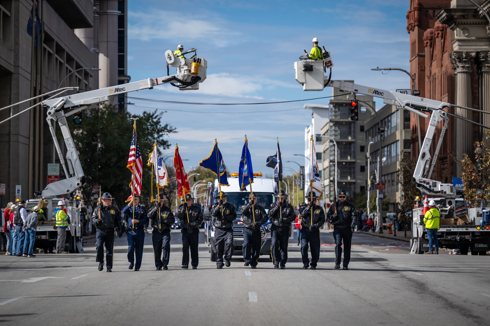 The Veterans of Foreign Wars Post 1170 Honor Guard leads off the annual Veterans Day Parade in downtown Louisville, Ky., Nov. 9, 2024. The event featured appearances by more than 50 organizations, including the Kentucky Air National Guard and its Mini C-130 Hercules scale replica. (U.S. Air National Guard photo by Dale Greer)