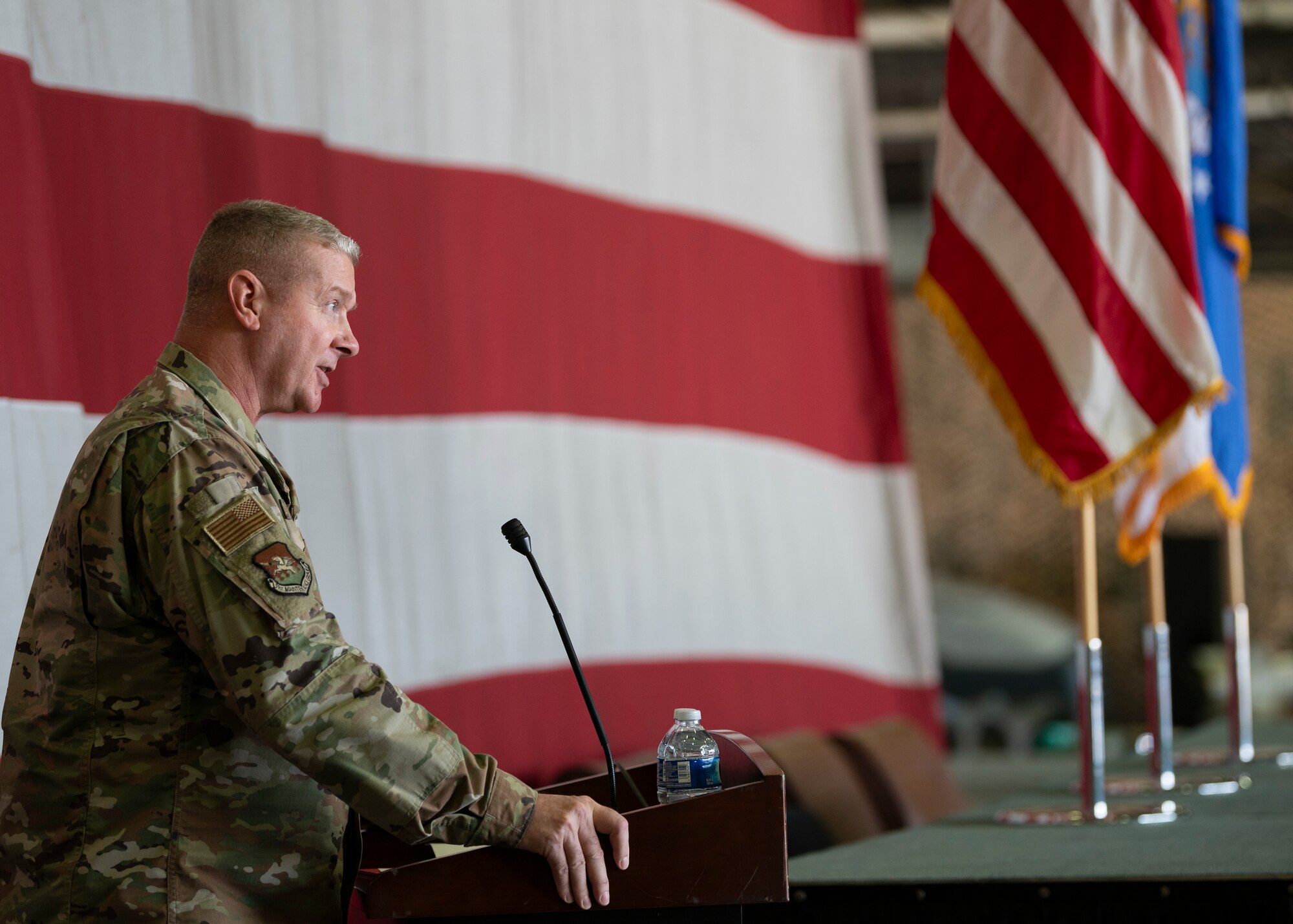 U.S. Air Force Col. Kenneth Beebe, 51st Maintenance Group commander, delivers a speech during a Dedicated Crew Chief Ceremony at Osan Air Base, Republic of Korea, Oct. 25, 2024. The purpose of the DCC Ceremony is to formally appoint the crew chiefs selected as DCCs to assume responsibility for their aircraft. Pilots presented the crew chiefs with their certificates and gave them a “Fiends” patch in congratulations. (U.S. Air Force photo by Staff Sgt. Ashley N. Mikaio)