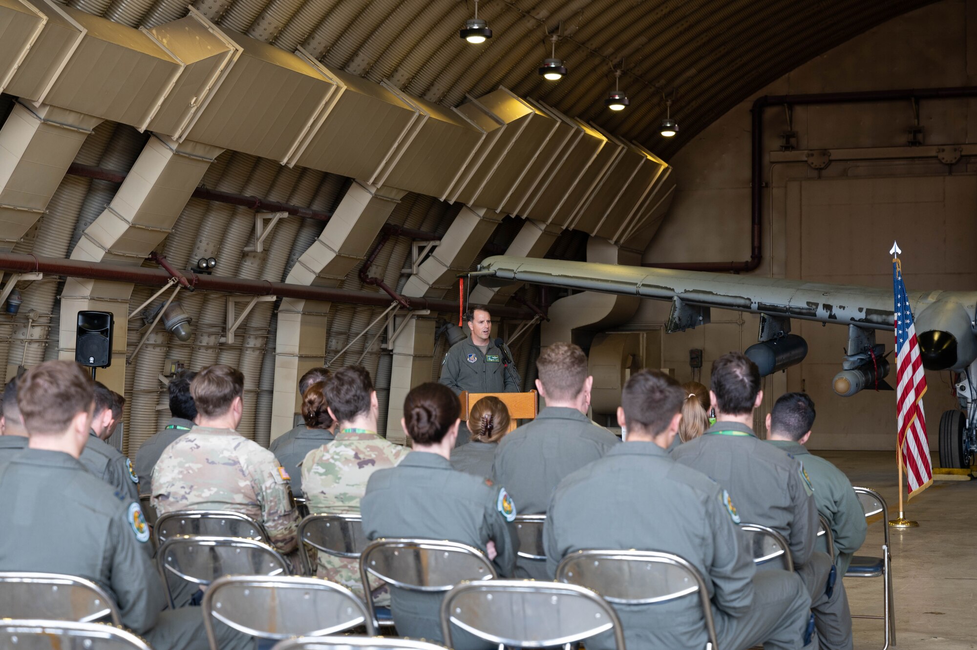 U.S. Air Force Lt. Col. Justin Davis, 25th Fighter Squadron commander, speaks during the 25th Fighter Generation Squadron Dedicated Crew Chief Ceremony at Osan Air Base, Republic of Korea, Nov. 4, 2024.  Dedicated crew chief’s are selected on the basis of initiative, management and leadership ability and technical knowledge. (U.S. Air Force photo by Staff Sgt. Christopher Tam