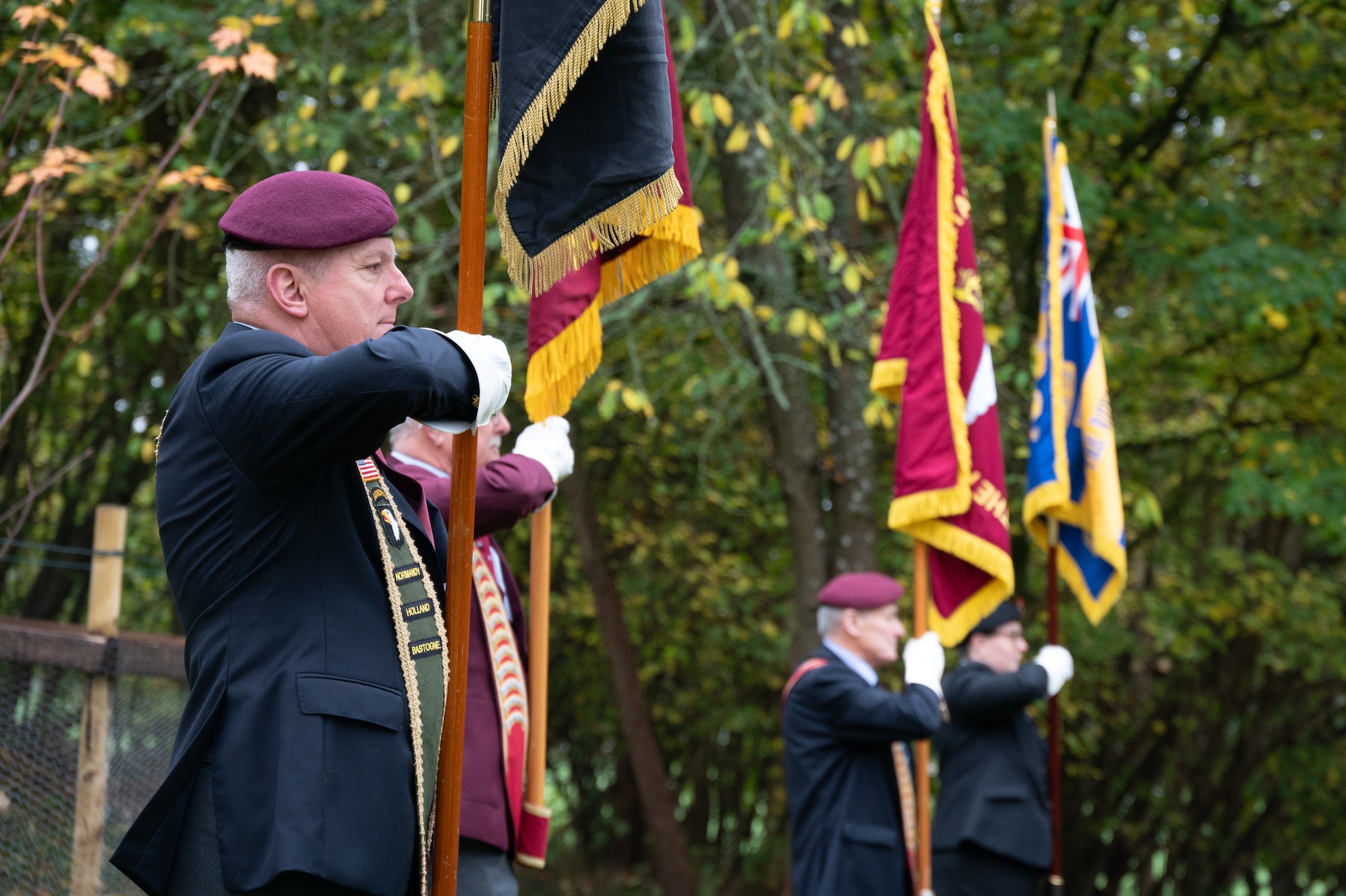 Flag bearers present the colors