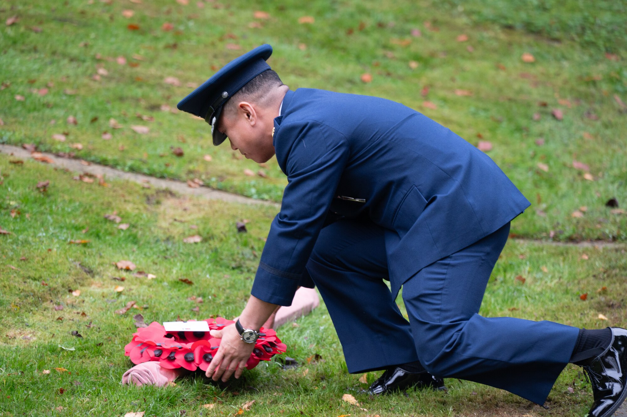 U.S. Air Force Maj. Marques L. Reyes, 420th Munitions Squadron commander places a wreath