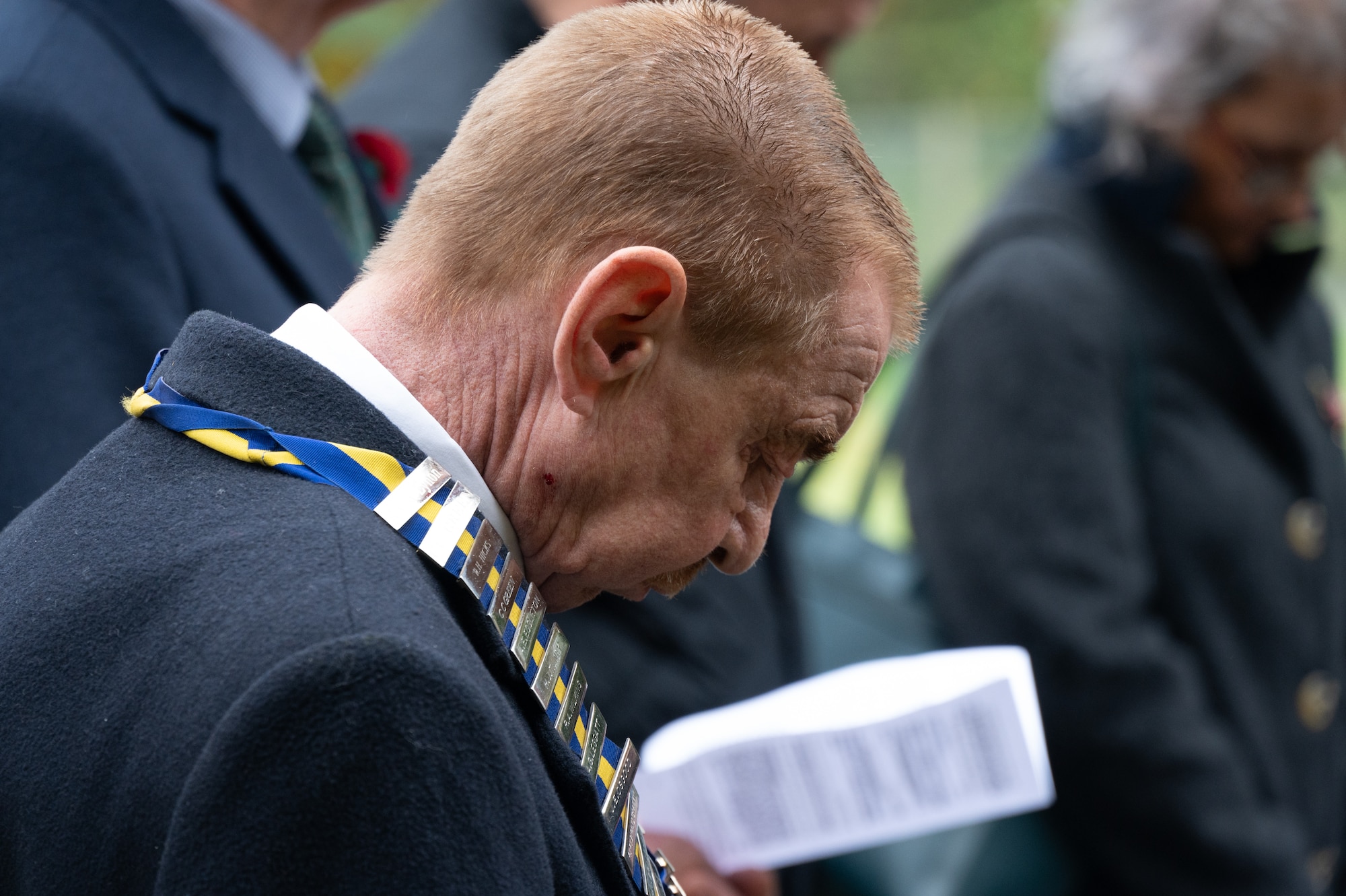 Colin Hyland, Chairman of Newbury, bows his head