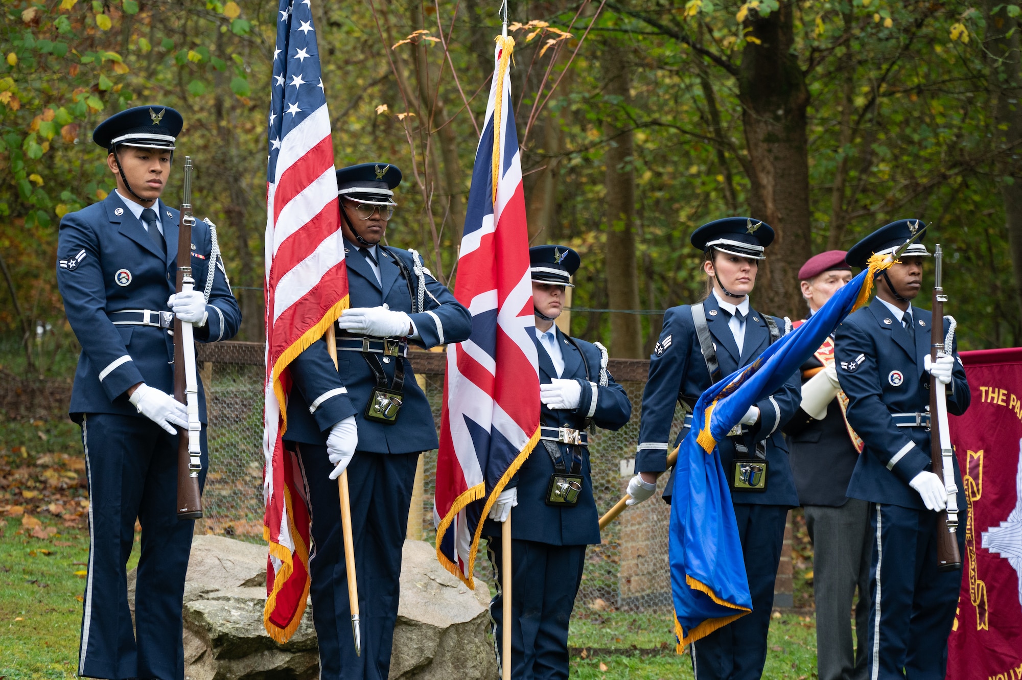 honor guardsmen present the colors