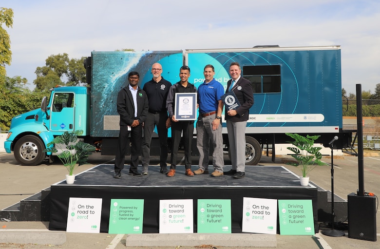 (Left to right): Accelera™ by Cummins' Linga Raju Reka, DHS S&T's Ron Langhelm, Accelera™ by Cummins' Prateek Vaish, ERDC's Nick Josefik, GUINNESS WORLD RECORDS™ Michael Empric standing with title certificate