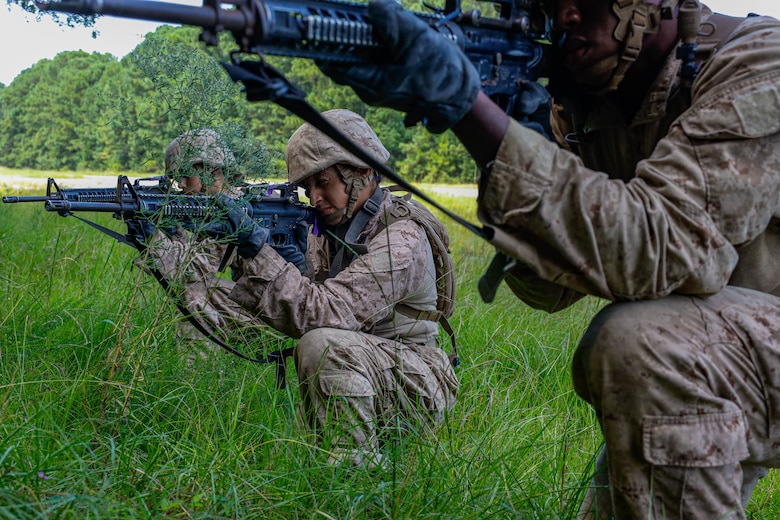 Rct. Alexis Banks, a recruit with Golf Company, 2nd Recruit Training Battalion, prepares for an upcoming event during the Crucible, on Marine Corps Recruit Depot Parris Island, S.C., Aug 22, 2024. Banks formerly served as a sergeant in the U.S. Army and chose to conduct an interservice transfer and join the U.S. Marine Corps