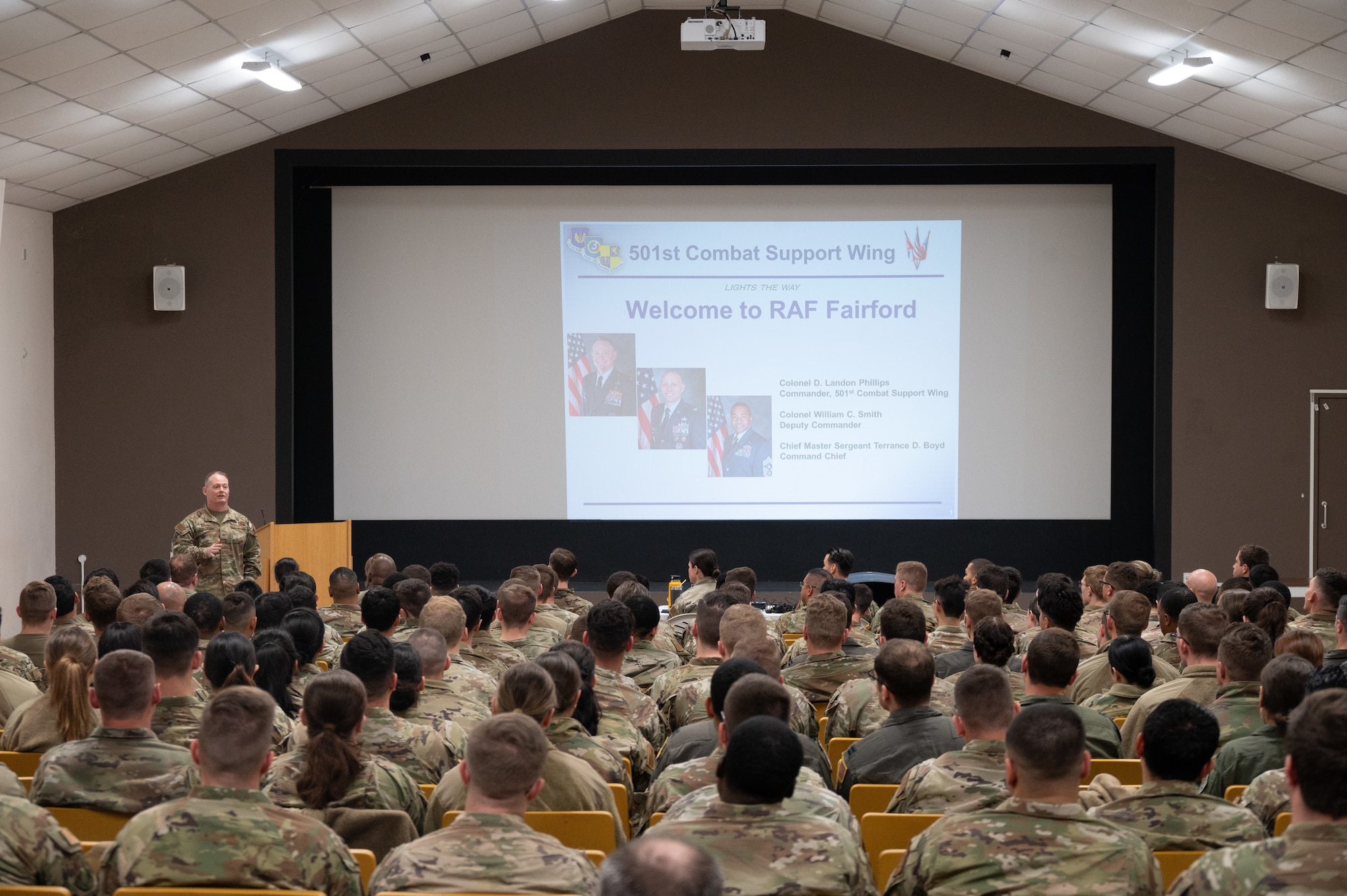 U.S. Air Force Col. D. Landon Phillips, 501st Combat Support Wing commander, speaks to deployed Airmen