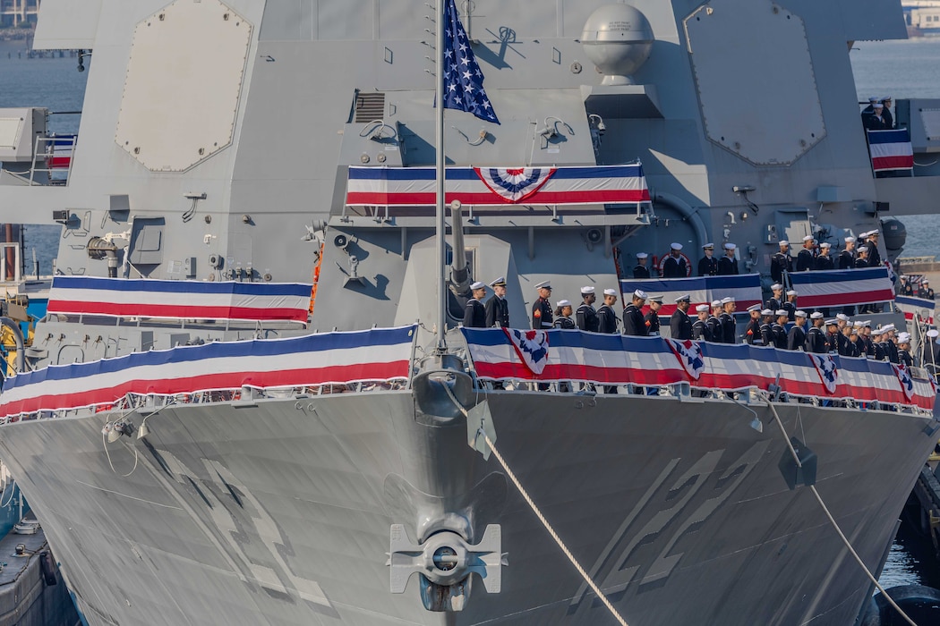 USS John Basilone (DDG 122) is commissioned in New York.