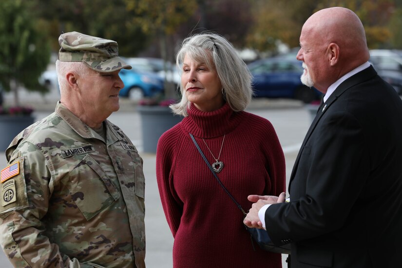 Maj. Gen. Lamberton, adjutant general of the Kentucky National Guard (left), and his wife arrive at Churchill Downs for Survivors' Day at the Races in Louisville, Kentucky, Nov. 3, 2024. The United States Army Survivor Outreach Services team partners with Churchill Downs each year for this event.