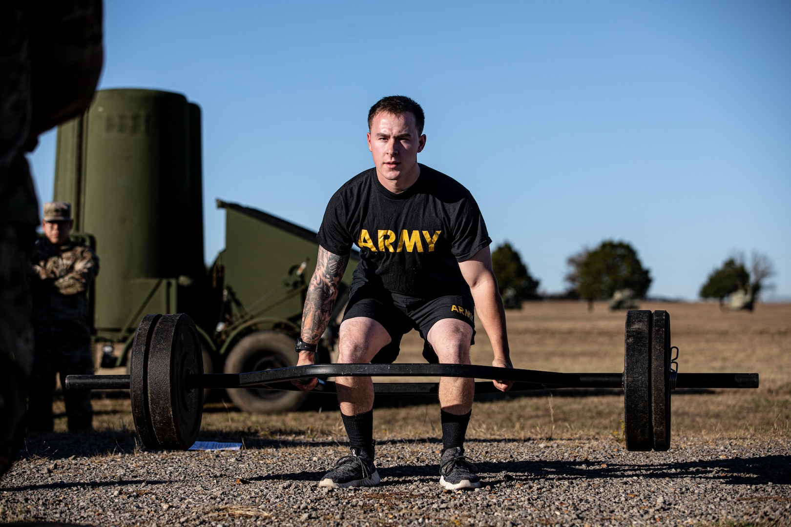 Spc. Gage Wilson, a resident of Claremore, Oklahoma assigned to Headquarters Company, 45th Infantry Brigade Combat Team as a cable systems installer, performs a deadlift during the Army Combat Fitness Test at the Oklahoma Army National Guard Best Warrior Competition at Camp Gruber Training Center, Oklahoma, Nov. 6, 2024. The OKARNG Best Warrior Competition is an annual event designed to test and recognize the skills, endurance and professionalism of the best Soldiers and NCOs within the organization. (Oklahoma National Guard photo by Spc. Cambrie Cannon)