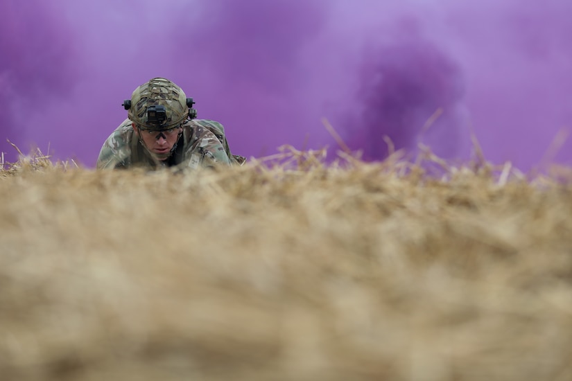 U.S. Army Spc. Todd Musgrove, an infantryman with Detachment 1, Headquarters and Headquarters Company, 1-149th Infantry Regiment, high-crawls to his objective during the 2025 Kentucky Best Warrior Competition held at Wendell H. Ford Regional Training Center in Greenville, Kentucky, Nov. 6, 2024. This competition showcases the adaptiveness, resilience, and lethality of our forces, affirming the readiness of National Guard citizen-Soldiers to meet the nation’s challenges.