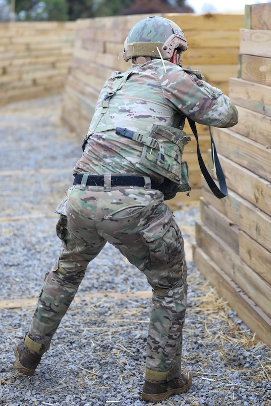 U.S. Army Sgt. Shea Moody, an infantryman with Bravo Company, 1-149th Infantry Regiment, clears a corner during the 2025 Kentucky Best Warrior Competition held at Wendell H. Ford Regional Training Center in Greenville, Kentucky, Nov. 6, 2024. This competition showcases the adaptiveness, resilience, and lethality of our forces, affirming the readiness of National Guard citizen-Soldiers to meet the nation’s challenges.