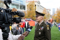 Gen. Randy George, Chief of Staff of the United States Army, conducts an interview with NBC 5 Chicago before the start of the Chicago Bears versus New England Patriots game on November 10, 2024, at Soldier Field.