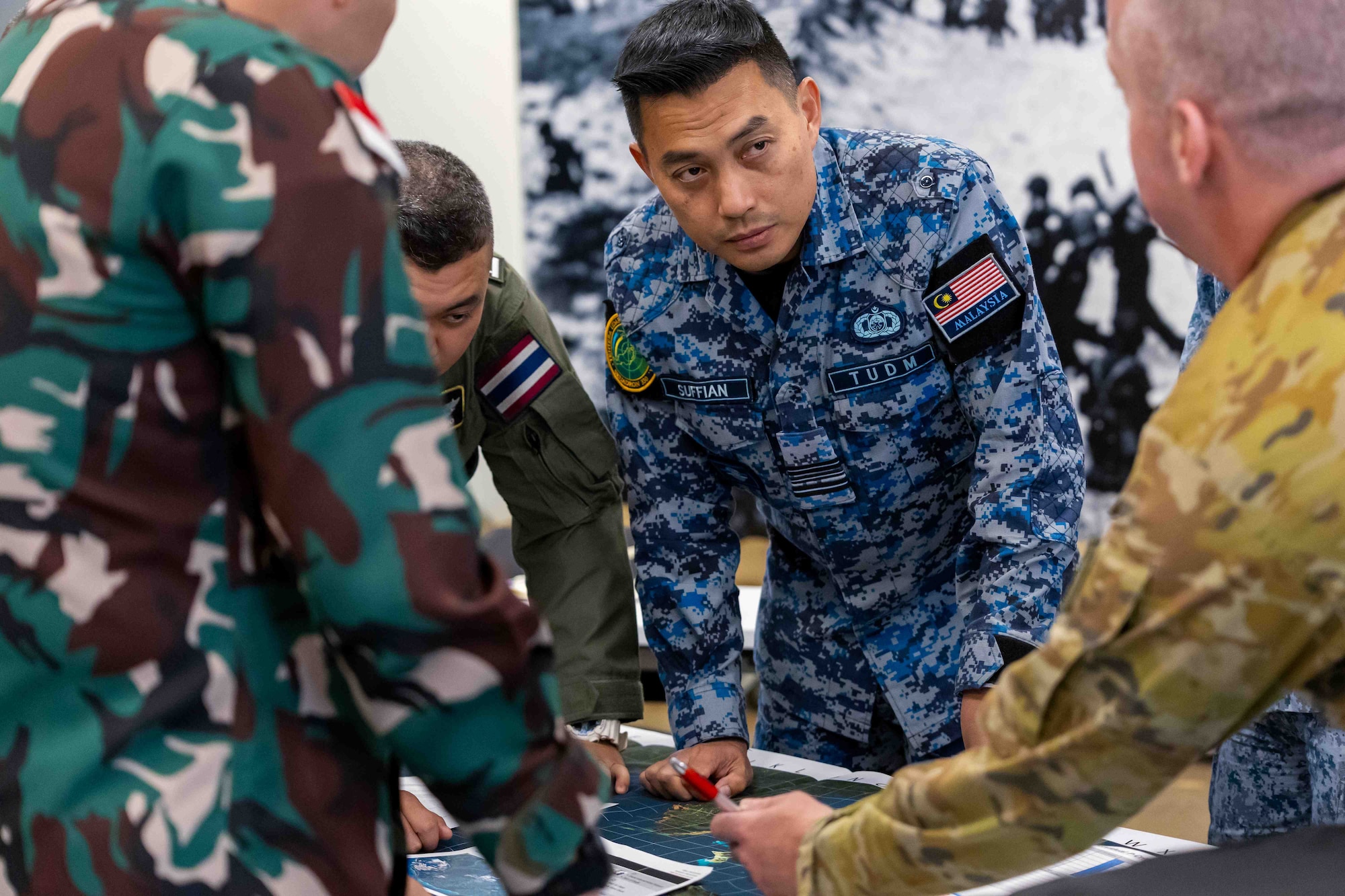 Members of Indonesian Air Force, Royal Thai Air Force, Royal Malaysian Air Force and the Australian Army collaborate to develop a fictional defense design. The Pacific IAMD Center facilitated 11 nations during the 2024 Multilateral Subject Matter Expert Exchange and Defense Design Workshop from 21-26 October on Fort Bliss, Texas.