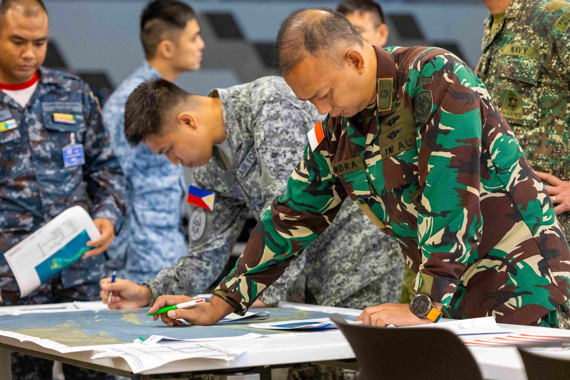 Members of the Indonesian Air Force, Philippine Air Force, Philippine Marine Crops and Royal Thail Air Force collaborate to develop a fictional defense design. The Pacific IAMD Center facilitated 11 nations during the 2024 Multilateral Subject Matter Expert Exchange and Defense Design Workshop from 21-26 October on Fort Bliss, Texas.