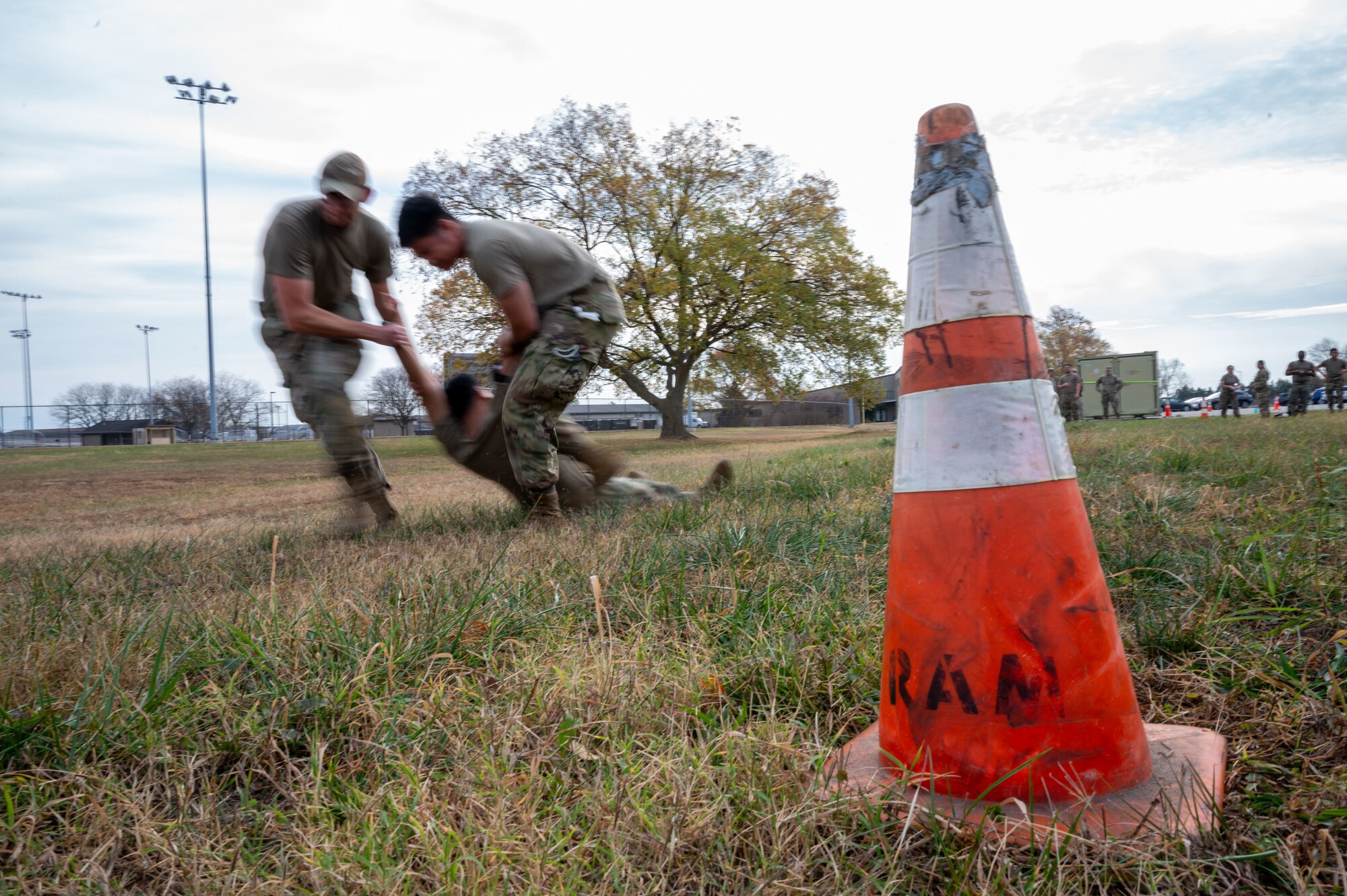 Members from the 436th Logistics Readiness Squadron perform a buddy drag during the LRS Mission Ready Airman Rodeo at Dover Air Force Base, Delaware, Nov. 7, 2024. The Rodeo consisted of three events intended to prepare Airmen for the future fight and meet MRA qualifications in a competitive, engaging and safe competition. (U.S. Air Force photo by Senior Airman Amanda Jett)