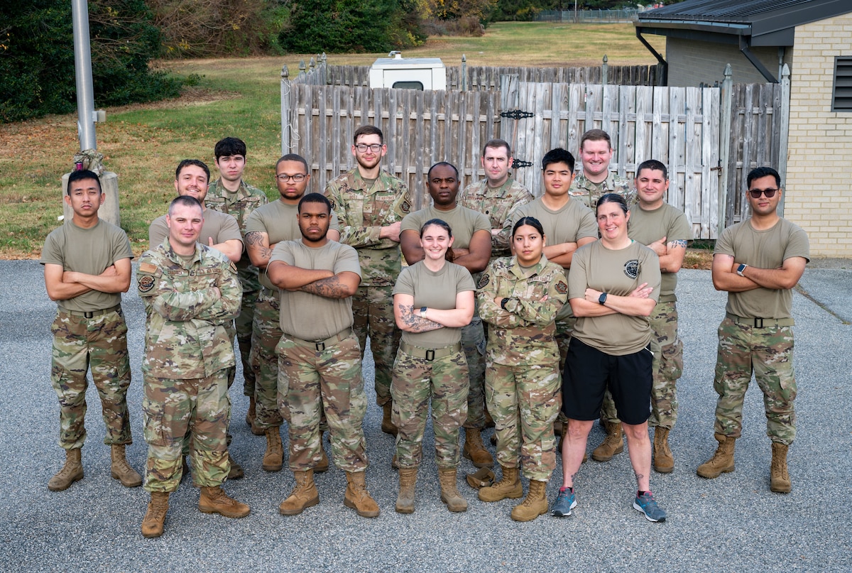 Members from the 436th Logistics Readiness Squadron pose for a group photo during the LRS Mission Ready Airman Rodeo at Dover Air Force Base, Delaware, Nov. 7, 2024. The Rodeo consisted of three events intended to prepare Airmen for the future fight and meet MRA qualifications in a competitive, engaging and safe competition. (U.S. Air Force photo by Senior Airman Amanda Jett)