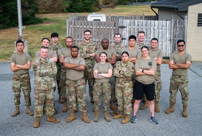 Members from the 436th Logistics Readiness Squadron pose for a group photo during the LRS Mission Ready Airman Rodeo at Dover Air Force Base, Delaware, Nov. 7, 2024. The Rodeo consisted of three events intended to prepare Airmen for the future fight and meet MRA qualifications in a competitive, engaging and safe competition. (U.S. Air Force photo by Senior Airman Amanda Jett)