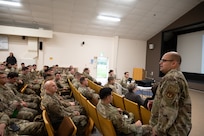 U.S. Air Force Senior Master Sgt. Gilberto Bernal, 420th Air Base Squadron Senior Enlisted Leader, speaks to deployed Airmen