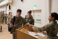 Pathfinders process deployed Airmen during an in-processing brief