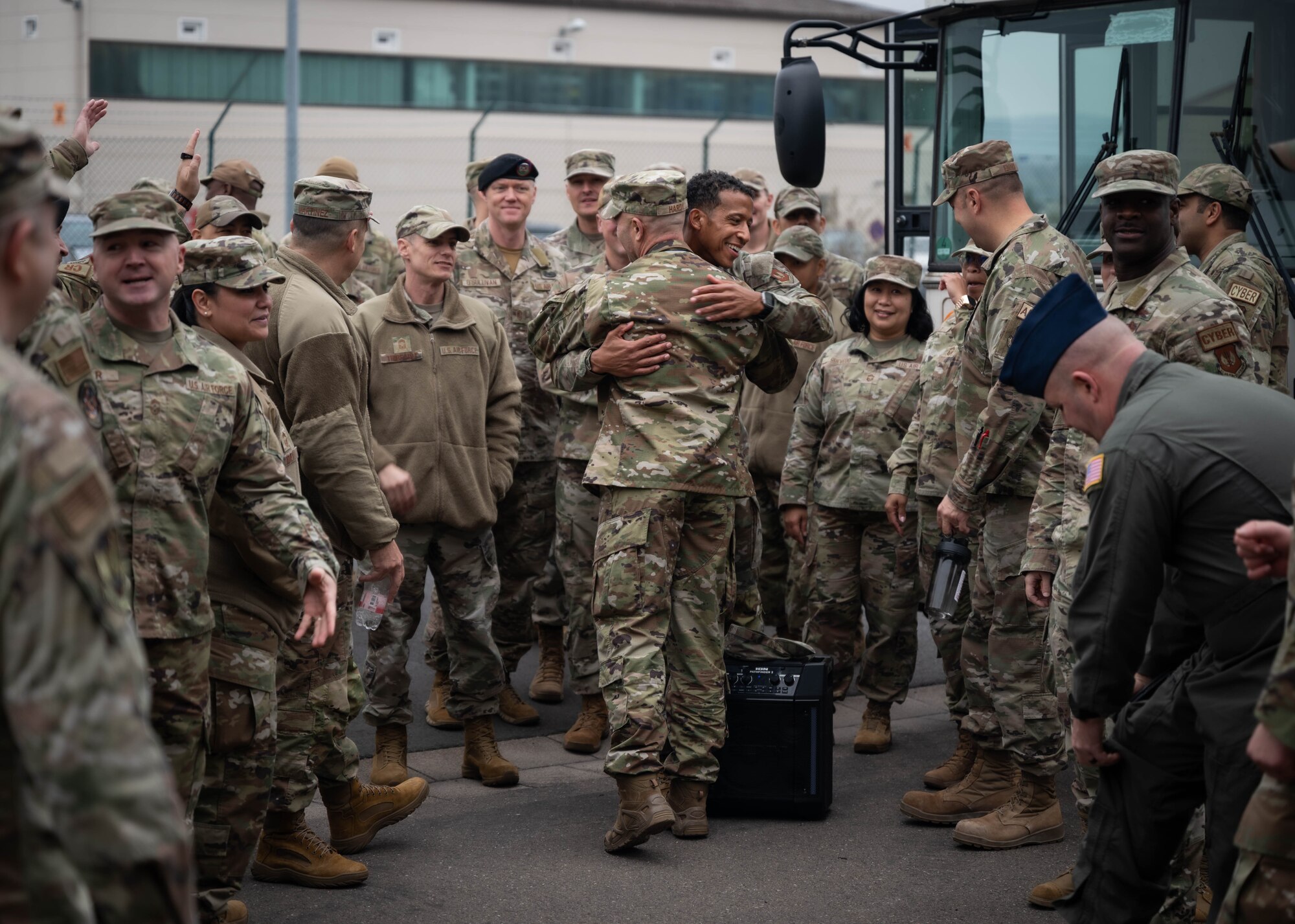 U.S. Air Force Airmen assigned to Ramstein Air Base, Germany, congratulate U.S. Air Force Senior Master Sgt. David Hardy, 86th Munitions Squadron materiel flight chief, on his promotion to Chief Master Sergeant at Ramstein AB, Nov. 7, 2024. Chief Master Sergeants from multiple units on base congratulated Airmen on their selection for promotion to Chief Master Sergeant before taking them to a release party. (U.S. Air Force Photo by Senior Airman Jared Lovett)