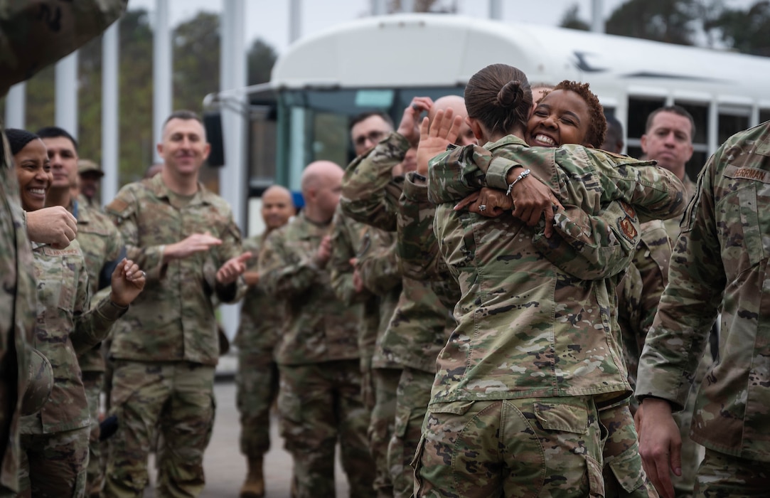 U.S. Air Force Airmen assigned to Ramstein Air Base, Germany, congratulate U.S. Air Force Senior Master Sgt. Sylvia Taylor, Allied Air Command Air Force Element senior enlisted leader, on her promotion to Chief Master Sgt. at Ramstein AB, Nov. 7, 2024. After congratulations were given, the newly selected Chief Master Sergeants joined the selectees on buses to surprise other Airmen on their promotions. (U.S. Air Force Photo by Senior Airman Jared Lovett)