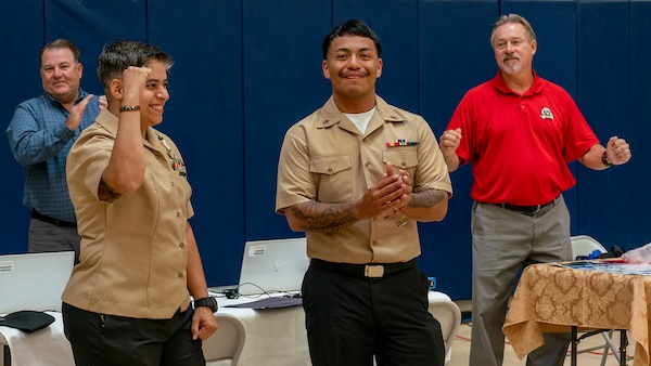 Navy Community College representatives discuss educational opportunities with Sailors at Career Development Symposium Southwest.