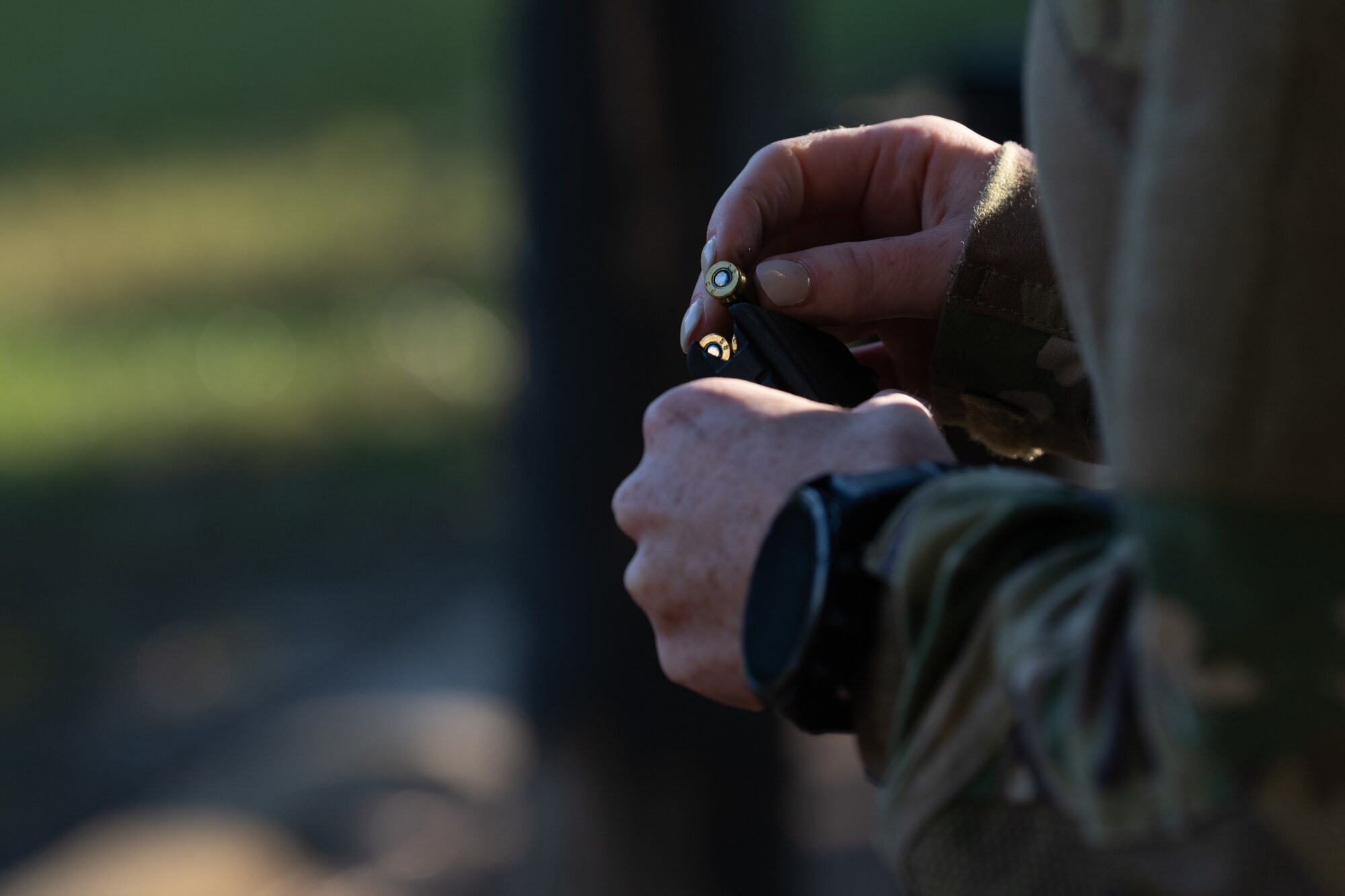 A U.S. Air Commando, a contestant for the Service Member of the Year, loads ammo at Hurlburt Field, Florida, Oct. 29, 2024.