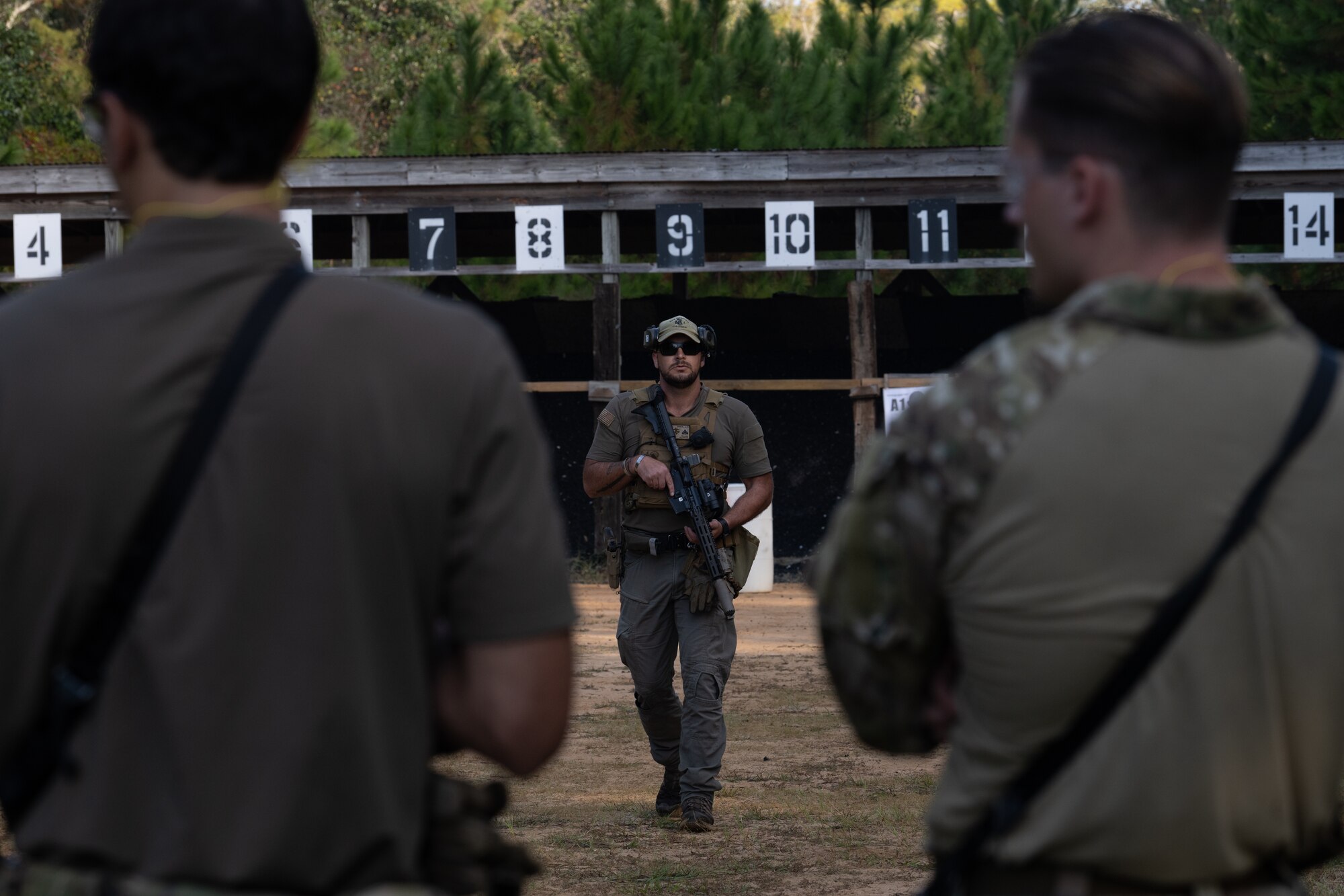 An instructor for the Service Member of the Year competition, demonstrates a firing exercise at Hurlburt Field, Florida, Oct. 29, 2024.