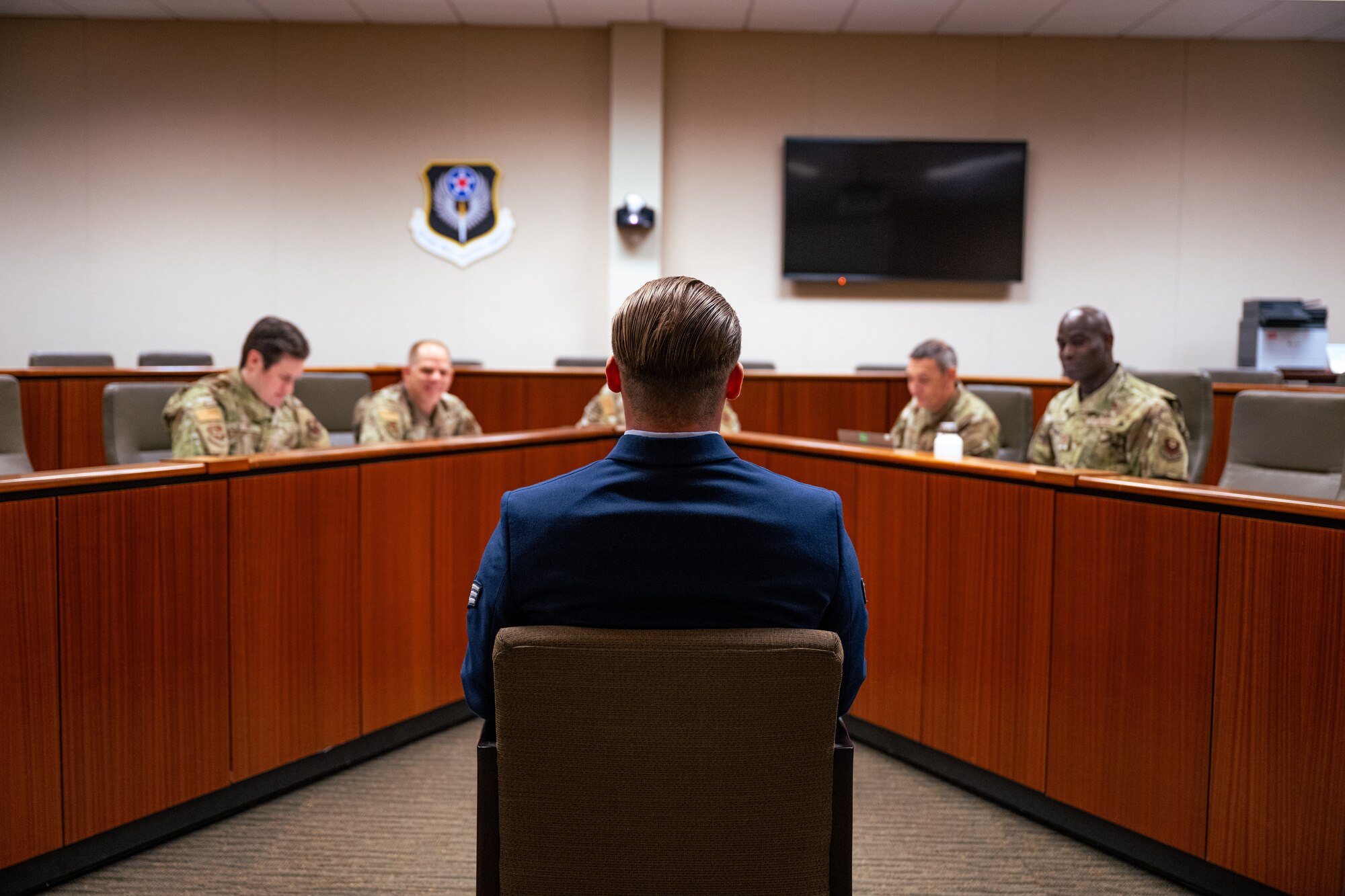 A U.S. Air Commando, a contestant of the Service Member of the Year competition, answers questions from five commanding chiefs during a panel at Hurlburt Field, Florida, Oct. 28, 2024.