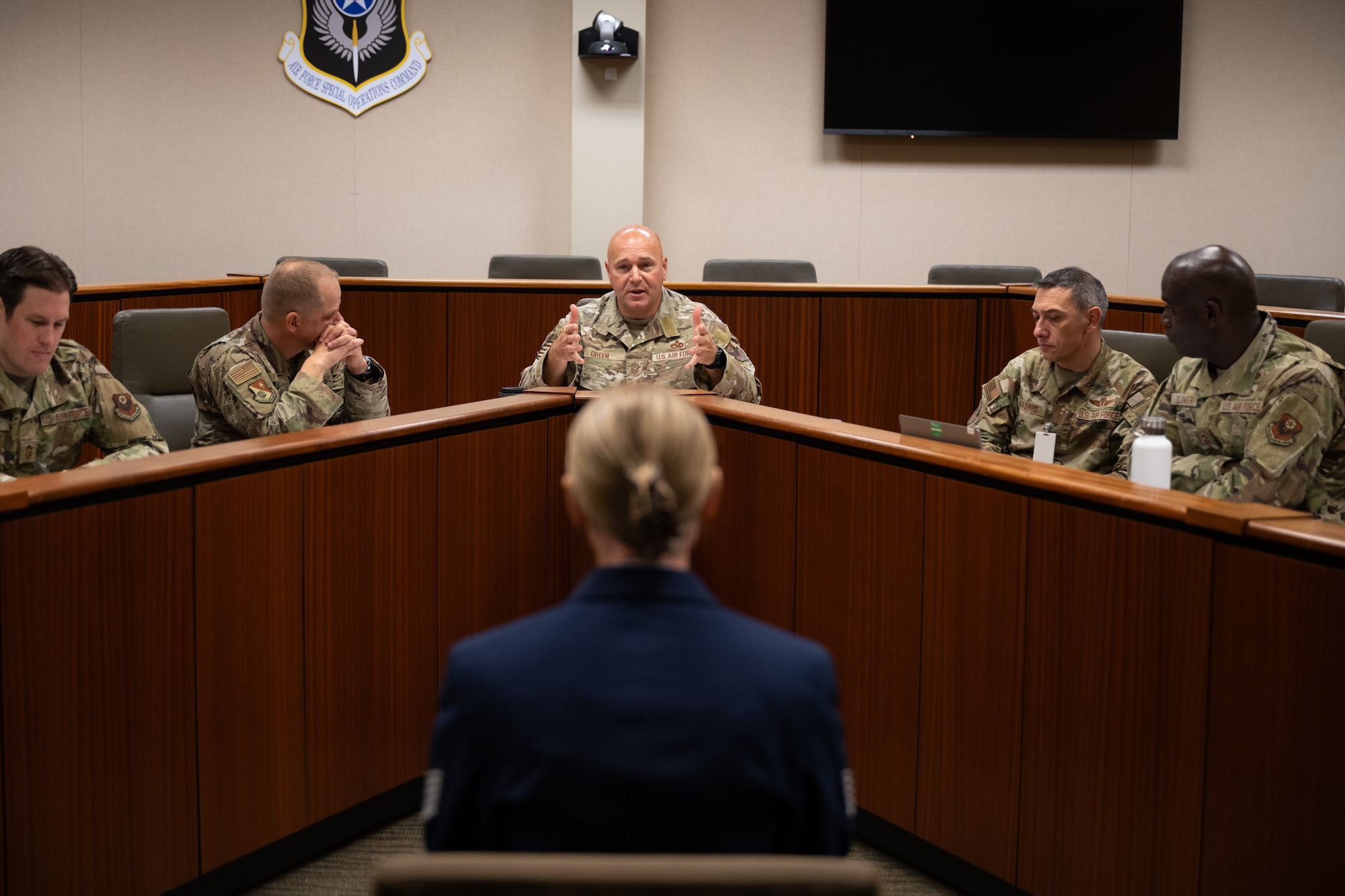 A U.S. Air Commando, a contestant of the Service Member of the Year competition, answers questions from five commanding chiefs during a panel at Hurlburt Field, Florida, Oct. 28, 2024.